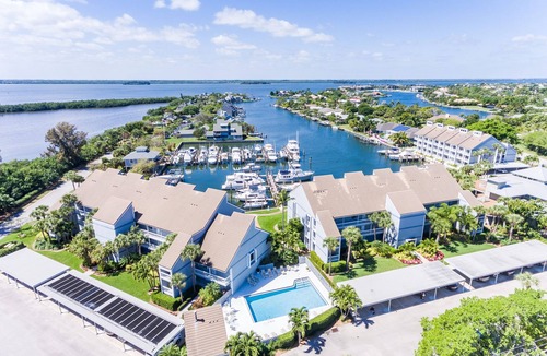 Moorings Condo | Harbor view, sunsets and a short walk to private beach access, we have it all!