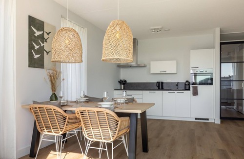 Kortgene Apartment | Harbour apartment with beautiful views