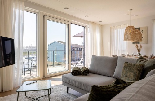 Kortgene Apartment | Harbour apartment with beautiful views