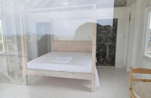 Codrington House | Harrys Cottages Cottage 5 right on the pink sand