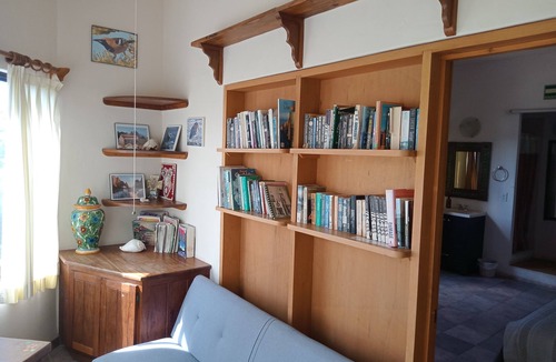 La Ribera Bed & Breakfast | HdP: Room #3 Library with one queen size bed and one sofa bed in separate room