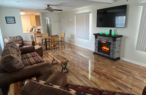 Angola Cabin | Heart Shaped Jacuzzi in main bedroom overlooking Fox Lake! Free Kayaks & Bikes