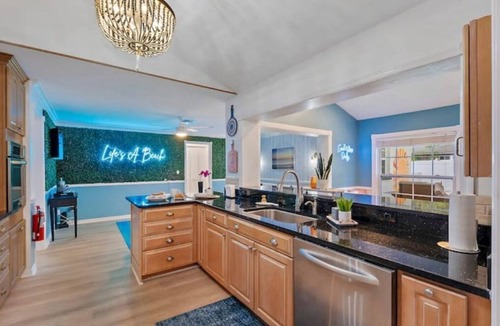 Clearwater House | Heated Pool Beach House Hot Tub, Fire Pit, Games