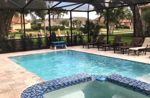 Palm River Estates House | Heated Pool Oasis, Minutes to Beach Family-Friendly Sleeps 10-12, 4 Bedrooms