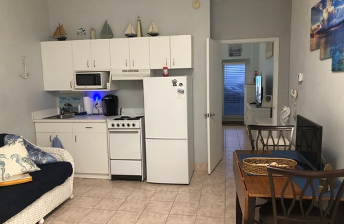 Lenox Park Condo | Heated pool. Right next to sunsplash park landshark grill and crabbys restaurant