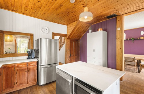 Mansonville House | Heritage home with spa, EV charger and walkable village