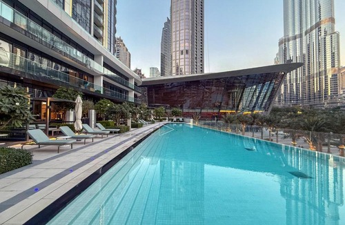 Downtown Dubai Apartment | Hermes-Style 2BR, Full Burj Khalifa View - Infinity Pool - Full Fountain View