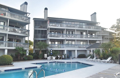 Surfside Beach Condo | Hermitage 1G- The perfect quite getaway with relaxing spacious balcony.