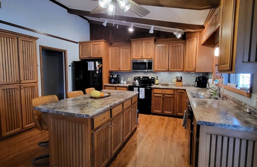 Centre House | Heron's Rest is a lakefront house with cabin feel, truly a diamond in the rough!
