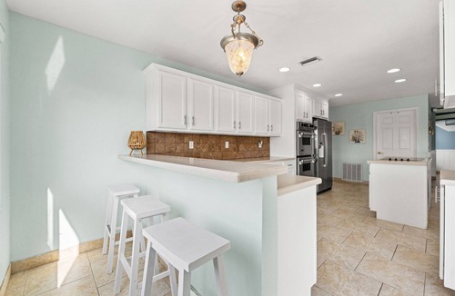 Spring Hill House | Hibiscus Beach House your vacation home loaded with amenities