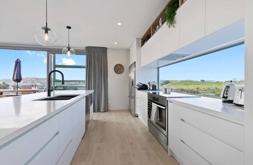 Raglan House | Hillside Haven Design-led Beach Escape