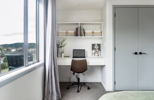 Raglan House | Hillside Haven Design-led Beach Escape