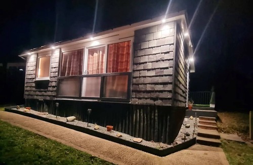 Bont Newydd Ski Chalet | Hillside Hideaway Chalet With Swimming Pool, Play Area, Fishing Lake