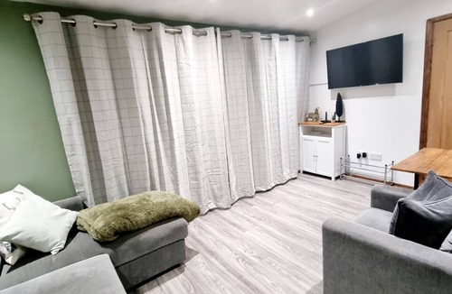 Bont Newydd Ski Chalet | Hillside Hideaway Chalet With Swimming Pool, Play Area, Fishing Lake