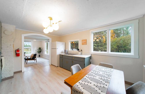 Homer House | Historic Bungalow on Centrally Located Half-Acre Private Lot