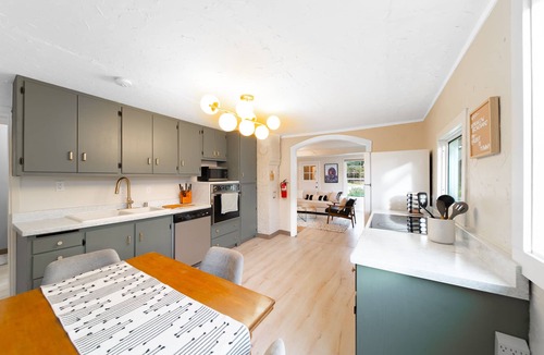 Homer House | Historic Bungalow on Centrally Located Half-Acre Private Lot