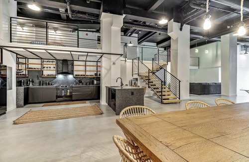 Center City East Apartment | Historic District Loft! Garage Parking! Sleeps 13