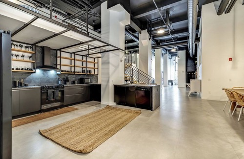 Center City East Apartment | Historic District Loft! Garage Parking! Sleeps 13