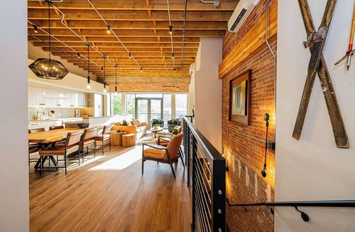 Ogden Apartment | Historic Elegance with Balcony Downtown View