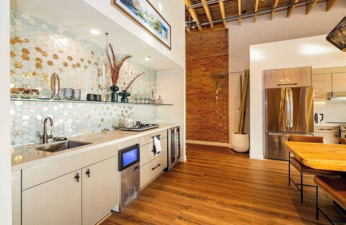 Ogden Apartment | Historic Elegance with Balcony Downtown View