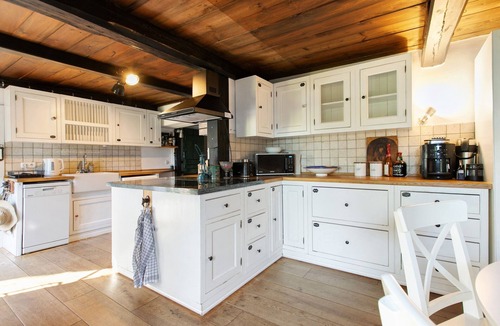 Eggstedt House | Historic 'Haus Reetglück' with Large Garden, Sauna, Antique Fireplace & Wi-Fi