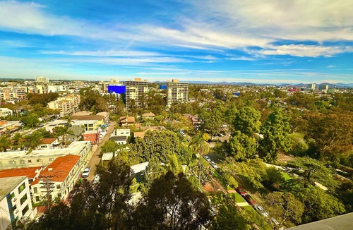 Hillcrest Condo | Historic post modern mid rise with floor to ceiling window views on Balboa Park.