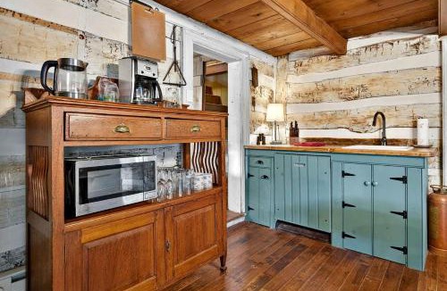 Augusta House | Historic Restored Farmhouse with Cowboy Cauldron Fire Pit Near Ice Mountain, Capon Bridge, West Virginia