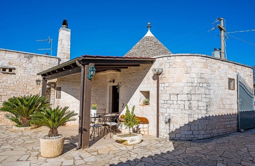 Coreggia Villa | Historic trulli surrounded by ancient olive trees