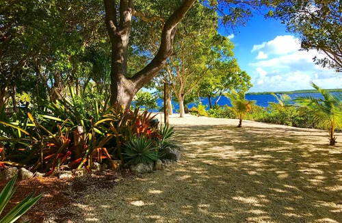 Anglers Park House | Historic Waterfront Home - 2 acres- Dock, Garden -Beach in Key Largo sleeps 16