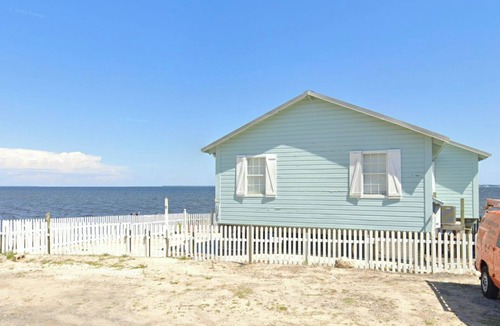 Freeport Cottage | Historical converted tavern surrounded by water, fabulous views, private dock.