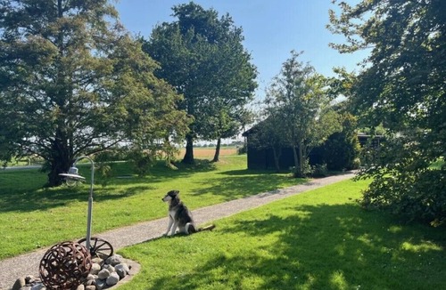 Wesselburenerkoog House | Holiday Apartment 'Holzhaus' with Private Terrace, Garden and Wi-Fi