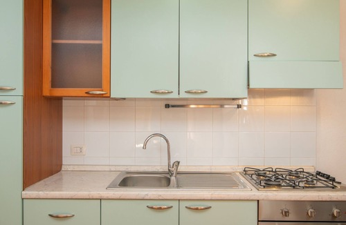 Capo Testa Apartment | Holiday Apartment 'Agostino' close to the Beach with Shared Terrace, Shared Garden & Wi-Fi