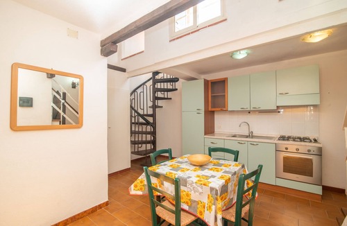 Capo Testa Apartment | Holiday Apartment 'Agostino' close to the Beach with Shared Terrace, Shared Garden & Wi-Fi