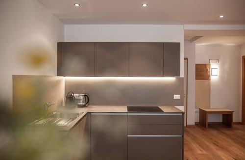 Santa Valburga Apartment | Holiday Apartment 'Pöder Flimkanzel' with Mountain View, Balcony, Shared Garden & Wi-Fi