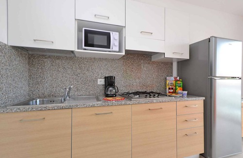 Lignano Sabbiadoro Apartment | Holiday apartment with air conditioning, internet, balcony and pool