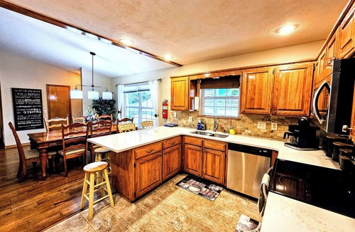 Holiday Island House | Holiday Haven On The Island! Sleeps 12! Fire pit! 6-Seater Golf Cart Included!