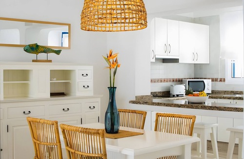 Arrieta House | Holiday Home 'Caleta Campos Bungalows' with Sea View, Shared Pool and Wi-Fi
