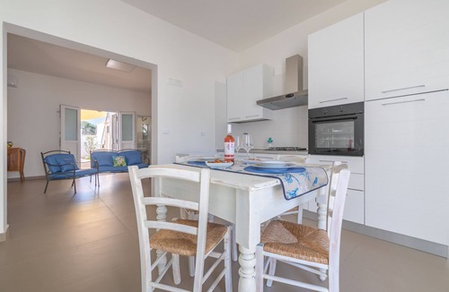 Punta Prosciutto Villa | Holiday home with veranda and parking near the sandy beach of Punta Prosciutto