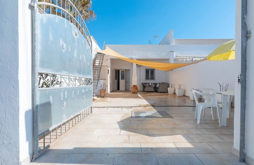 Punta Prosciutto Villa | Holiday home with veranda and parking near the sandy beach of Punta Prosciutto
