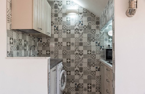 Seccagrande Apartment | Holiday Home 'Monolocale Arredato - Le Terrazze' with Sea View, Wi-Fi and Air Conditioning