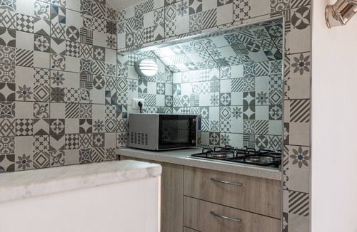 Seccagrande Apartment | Holiday Home 'Monolocale Arredato - Le Terrazze' with Sea View, Wi-Fi and Air Conditioning