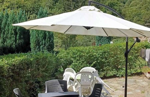 Ceppo Morelli House | Holiday home Situated in a quiet location in the mountains on the edge of the river with a view of the forest