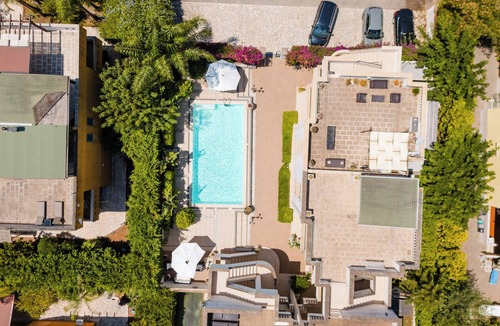 Santa Maria al Bagno House | Holiday Home 'Sofia' with Shared Pool, Balcony and Air Conditioning