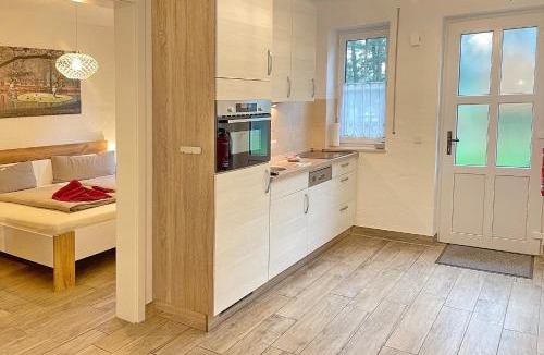 Burg-Kauper Apartment | Holzfäller Baum 2