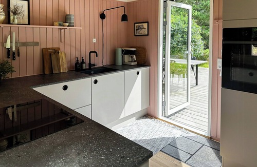 Fjellerup Strand House | Home with large plot near family-friendly beach