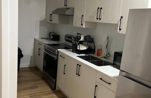 Chestermere House | Homely Comfort Room. Shared washroom with One