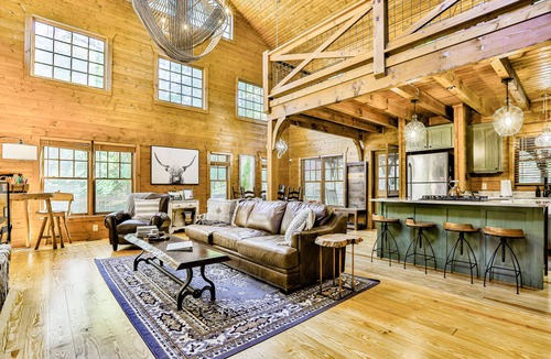 Young Harris Cabin | Homey riverfront cabin with hot tub, grill, wood fireplace, AC, & scenic views