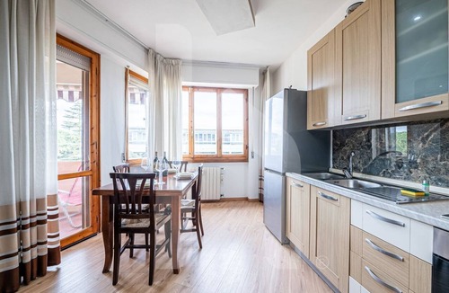 Pisa Apartment | [Homiday] Elegant apartment with wooden finishes in the central area.Relax and enjoy the three bright double bedrooms equipped with air conditioning and heating. Homiday offers the perfect accommodation for those who travel for work or leisure, in the ar