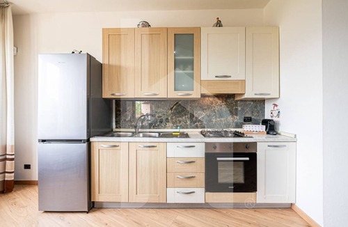 Pisa Apartment | [Homiday] Elegant apartment with wooden finishes in the central area.Relax and enjoy the three bright double bedrooms equipped with air conditioning and heating. Homiday offers the perfect accommodation for those who travel for work or leisure, in the ar