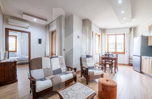 Pisa Apartment | [Homiday] Elegant apartment with wooden finishes in the central area.Relax and enjoy the three bright double bedrooms equipped with air conditioning and heating. Homiday offers the perfect accommodation for those who travel for work or leisure, in the ar